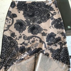 Beige and black floral print skirt